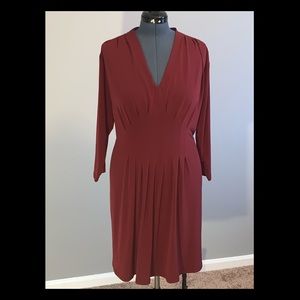 Flirty maroon A-line dress with v neck and pleats